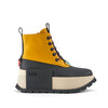 Botín de piel amarillo con cordones y plataforma para mujer.